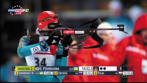 Елена Пидгрушная, олимпийская чемпионка 2014 года в эстафете, и ее биатлонная винтовка калибра .22 LR
